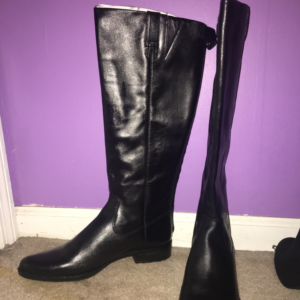 Black Calvin Klein leather boots
